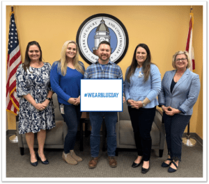 Clerk's Office staff wear blue to signify support of human trafficking prevention. 